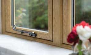 timber-look windows in oak finish close up