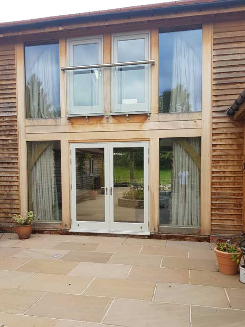 timber windows and doors in Royston to a barn style house