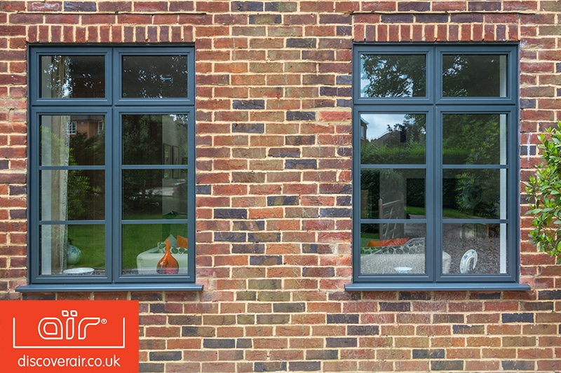 steel look windows in a modern brick house