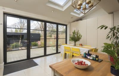 steel look bifold doors in a modern lounge origin product