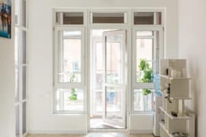 PVCu doors in a hallway looking out to a porch