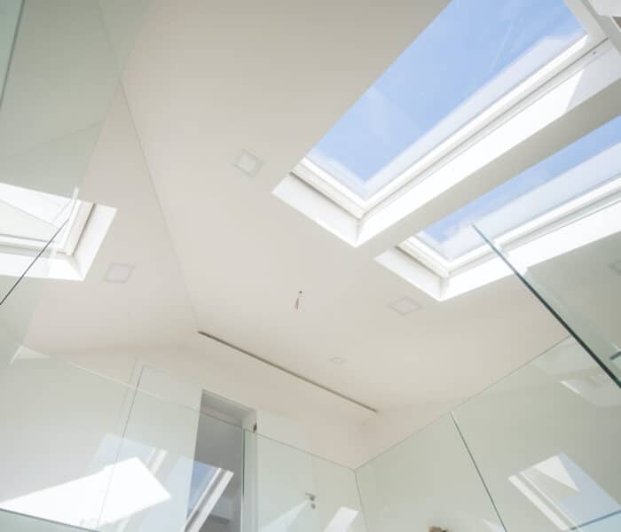 view of aluminium rooflights looking through at the sky