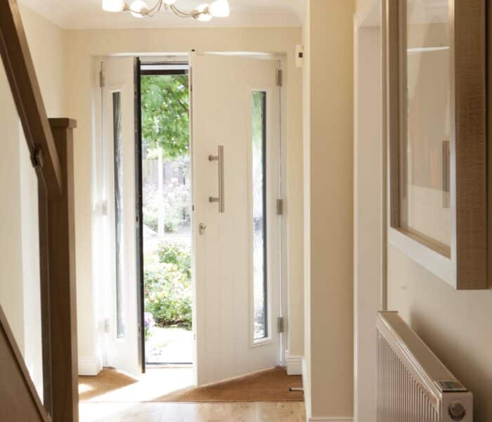 solidor front doors in a hallway, partially open